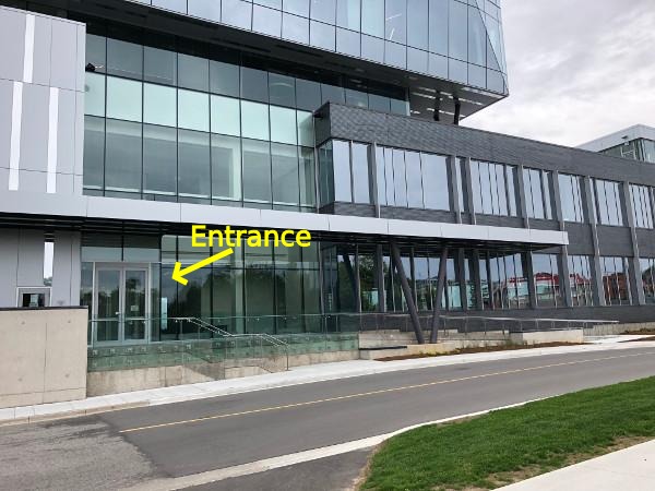 Glassy Google building, with front entrance indicated.